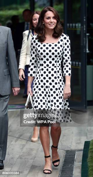 Catherine, Duchess of Cambridge, Patron of the All England Lawn Tennis and Croquet Club on day one of the Wimbledon Championships at The All England...