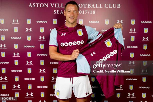 John Terry poses as he is unveiled as a new signing for Aston Villa, at Bodymoor Heath training ground on July 3, 2017 in Birmingham, England.