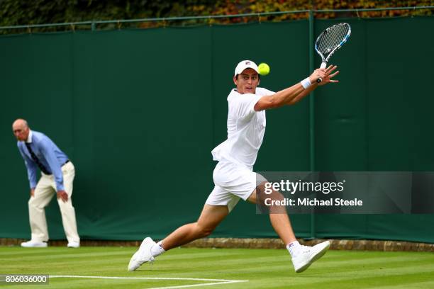 Andrew Whittington of Australia plays a backhand during the Gentlemen's Singles first round match against Thiago Monteiro of Brazil on day one of the...