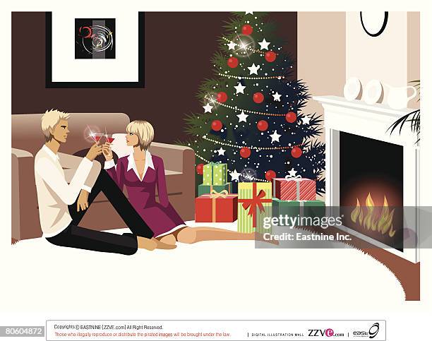 couple toasting with glasses of red wine near a christmas tree - photo frame on mantle piece stock illustrations