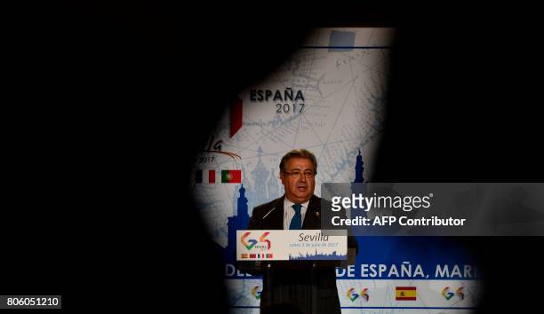 Spanish Minister of Interior Juan Ignacio Zoido speaks as he gives a press conference at the "Archivo de Indias" in Seville on July 3 during the G4...