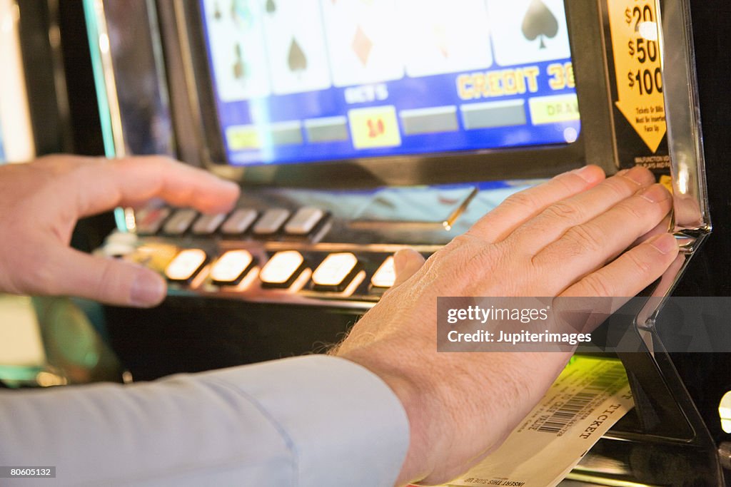 Man playing video poker