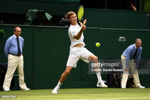 Alexander Bublik of Kazakhstan plays a forehand during the Gentlemen's Singles first round match against Andy Murray of Great Britain on day one of...