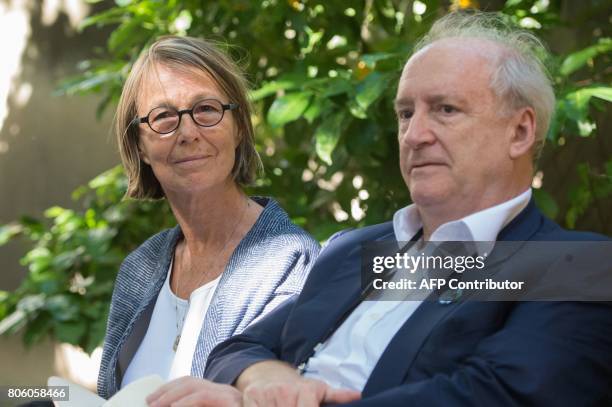 French Culture Minister Francoise Nyssen looks on next to Former French foreign minister and Arles photography festival president Hubert Vedrine...