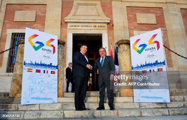 Spanish Minister of Interior Juan Ignacio Zoido shakes hands with Moroccan Minister of Interior Abdelouafi Laftit before a meeting at the "Archivo de...