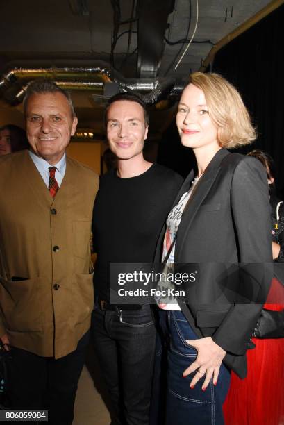 Jean Charles De Castelbajac, Maxime Simoens and Pauline de Drouas attend the Azzaro Couture Haute Couture Fall/Winter 2017-2018 show as part of Haute...