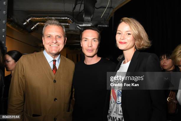 Jean Charles De Castelbajac, Maxime Simoens and Pauline de Drouas attend the Azzaro Couture Haute Couture Fall/Winter 2017-2018 show as part of Haute...