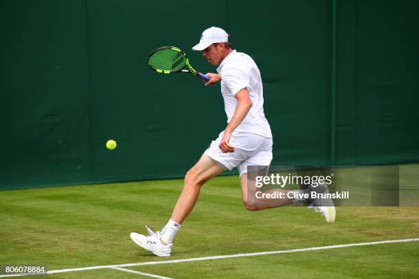 Sam Querrey of the United States watches the ball during the Gentlemen's Singles first round match against Thomas Fabbiano of Italy on day one of the...