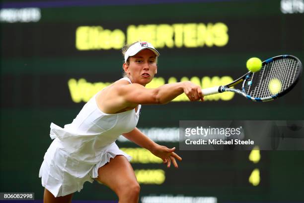 Elise Mertens of Belgium plays a backhand during the Ladies Singles first round match against Venus Williams of the United States on day one of the...