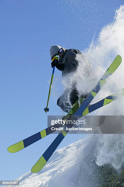 skier performing iron cross stunt - iron cross stock pictures, royalty-free photos & images