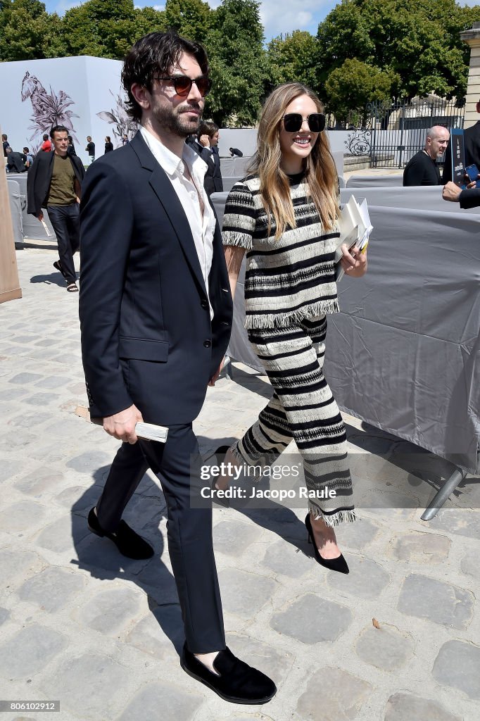 Elizabeth Olsen and Robbie Arnett are seen arriving at the 'Christian ...