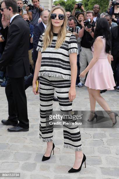 Elizabeth Olsen is seen arriving at the 'Christian Dior' show during Paris Fashion Week - Haute Couture Fall/Winter 2017-2018 on July 3, 2017 in...