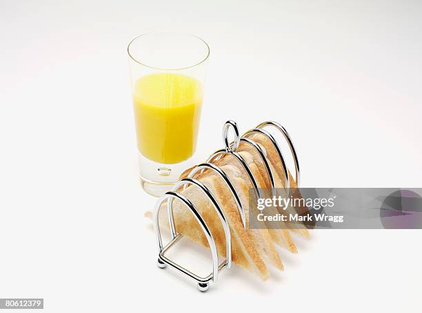toast and orange juice - toast rack stock pictures, royalty-free photos & images
