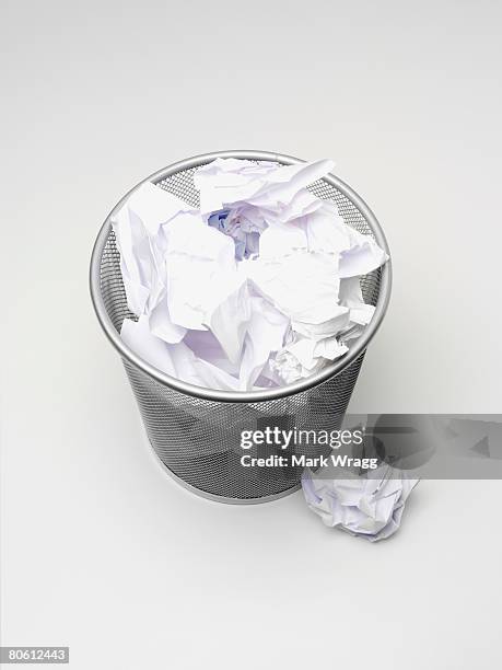 paper in wastebasket - wastepaper bin stock pictures, royalty-free photos & images