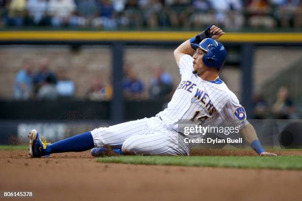 Hernan Perez of the Milwaukee Brewers advances to second base on a wild pitch in the second inning against the Miami Marlins at Miller Park on June...