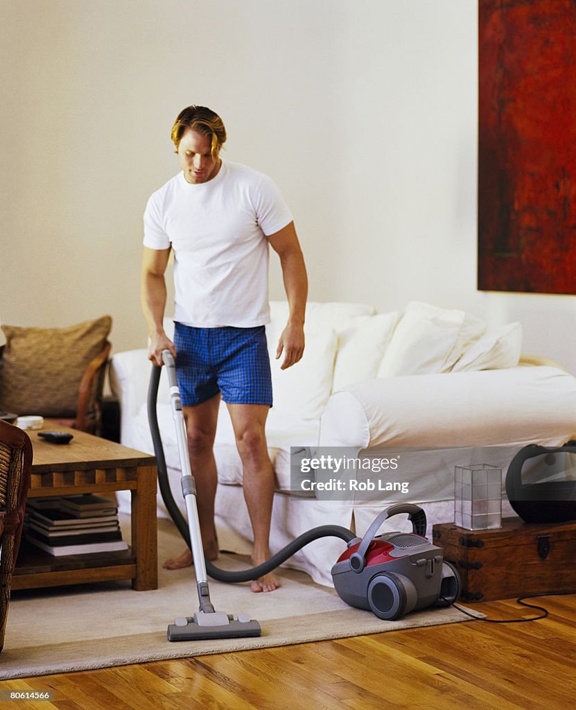 Man vacuuming