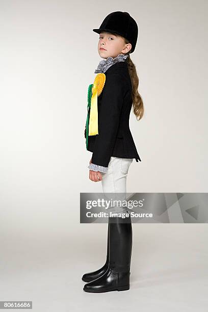 portrait of a horse rider - girl jumping stockfoto's en -beelden