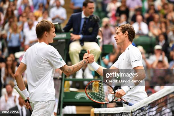 Andy Murray of Great Britain and Alexander Bublik of Kazakhstan shake hands after their Gentlemen's Singles first round match on day one of the...