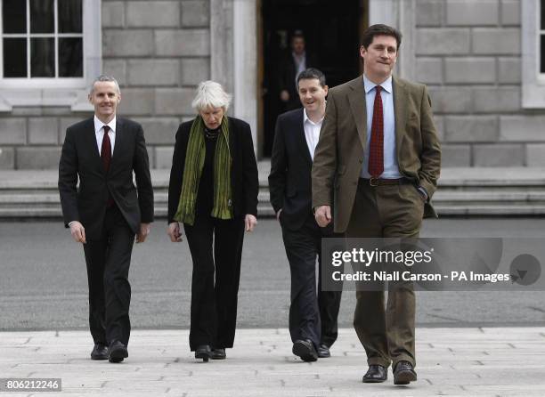 Ciaran Cuffe, Senator Mary White, TD Paul Gogarty and Communications Minister Eamon Ryan walk towards the media to give their reaction to the...