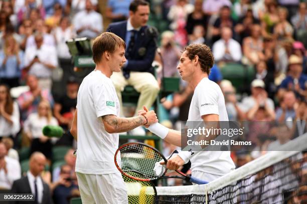 Andy Murray of Great Britain and Alexander Bublik of Kazakhstan shake hands after their Gentlemen's Singles first round match on day one of the...