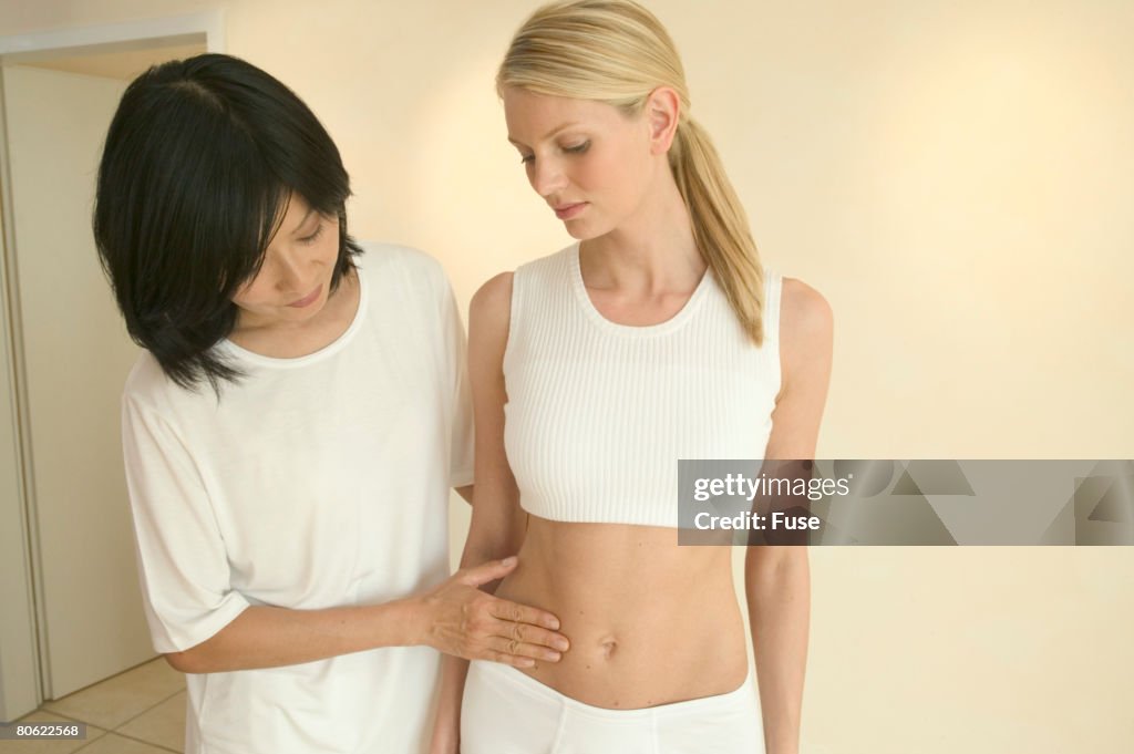 Doctor examining female patient