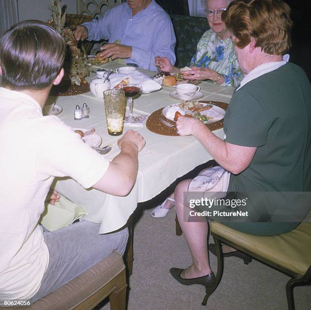 family having dinner - 1950 1960 stock pictures, royalty-free photos & images