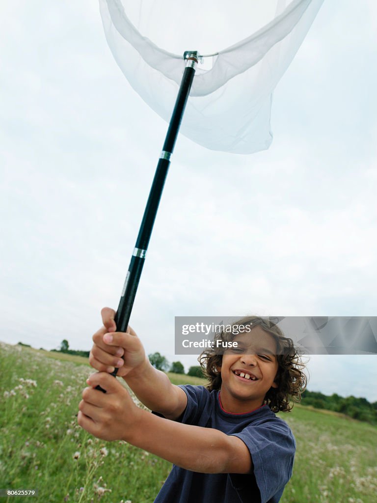 Boy Catching Butterflies
