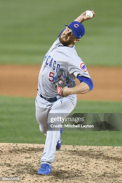 Justin Grimm of the Chicago Cubs pitches during a baseball game against the Washington Nationals at Nationals Park on June 28, 2017 in Washington,...