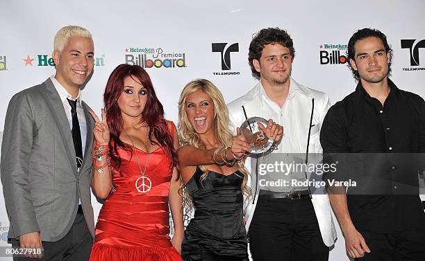 Musicians Christian Chavez, Dulce Maria, Anahi, Christopher Uckermann and Alfonso Poncho Herrera Rodriguez of RBD pose in the press room during the...