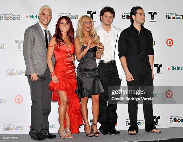 Musicians Christian Chavez, Dulce Maria, Anahi, Christopher Uckermann and Alfonso Poncho Herrera Rodriguez of RBD pose in the press room during the...