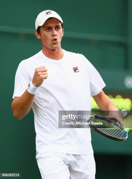 Andrew Whittington of Australia celebrates during the Gentlemen's Singles first round match on day one of the Wimbledon Lawn Tennis Championships at...