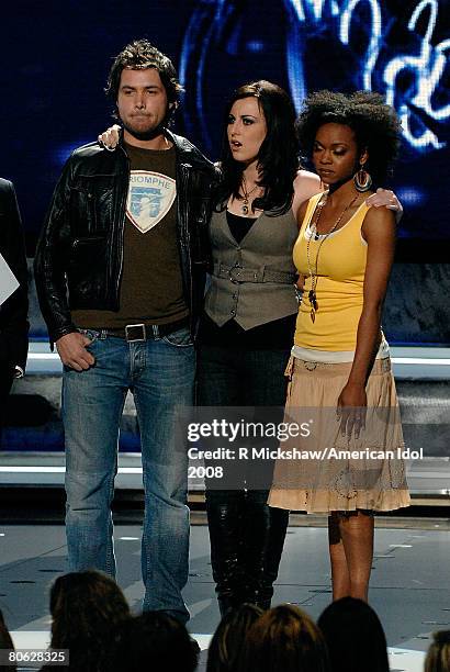 Contestants Michael Johns Carly Smithson and Syesha Mercado while finding out who will be eliminated from the competition during live show of...