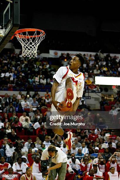 Brandon Jennings slam dunks during the McDonald's All-American High School Slam Dunk Competition on March 24, 2008 at the Bradley Center in...
