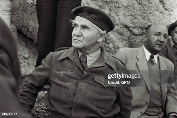 David Ben Gurion, the first Prime Minister of the Jewish State, wears military uniform during a visit on December 2, 1949 to the negev desert in...