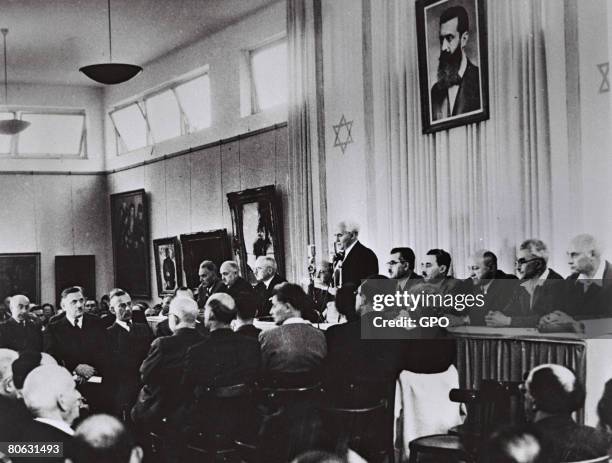 David Ben Gurion, who was to become Israel's first Prime Minister, reads the Declaration of Independence May 14, 1948 at the museum in Tel Aviv,...