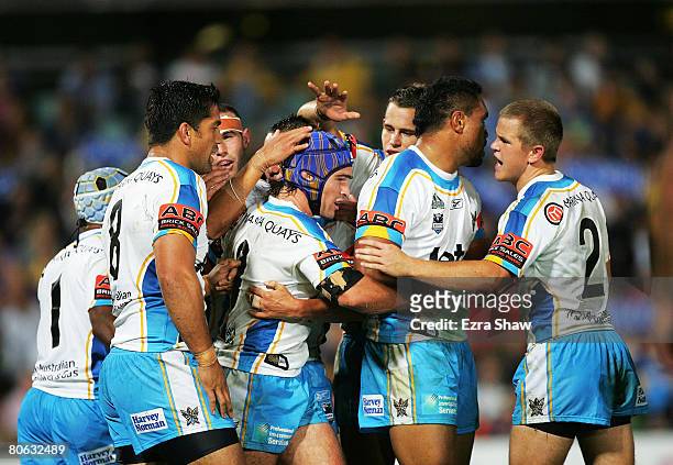 Nathan Friend of the Titans is congratulated by teammates after scoring a try during the round five NRL match between the Parramatta Eels and the...