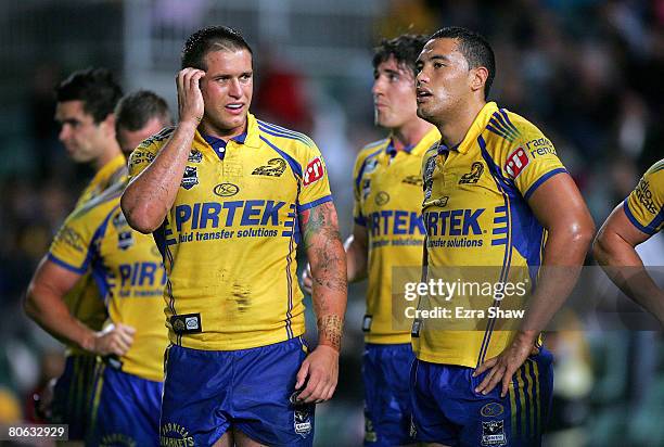 Josh Cordoba and Feleti Mateo of the Eels stand dejected after the Titans scored the winning try during the round five NRL match between the...