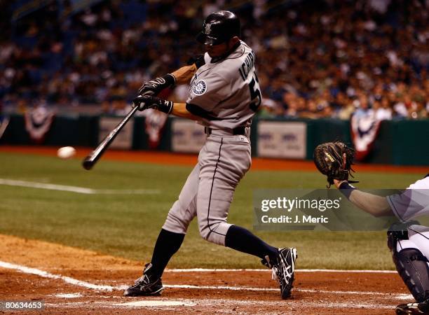 Outfielder Ichiro Suzuki of the Seattle Mariners fouls off a pitch against the Tampa Bay Rays during the game on April 8, 2008 at Tropicana Field in...