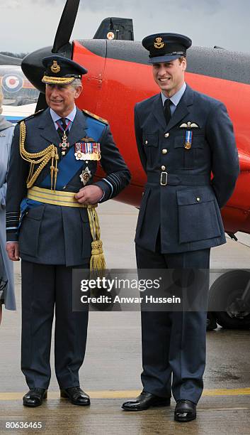 Prince William stands with his father, Prince Charles, Prince of Wales in front of the original Chipmonk aircraft Prince Charles flew when he was...