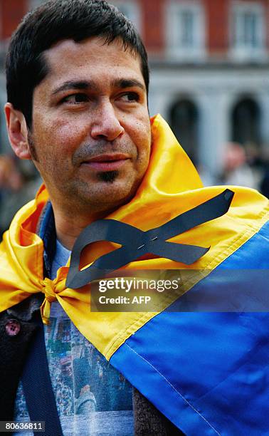 Proterstor during a rally in Madrid on April 11, 2008 against Venezuela's president Hugo Chavez on the sixth anniversary of mass demonstrations that...