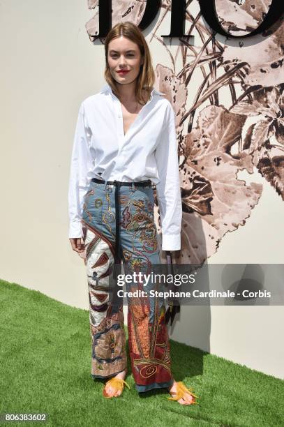 Camille Rowe attends the Christian Dior Haute Couture Fall/Winter 2017-2018 show as part of Haute Couture Paris Fashion Week on July 3, 2017 in...