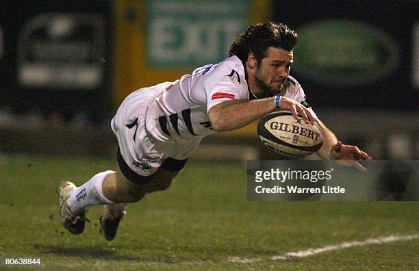 Ben Foden of Sale dives over to score a try during the Guinness Premiership match between Bristol Rugby and Sale Sharks at the Memorial Stadium on...