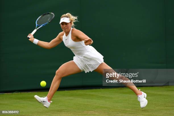Carina Witthoeft of Germany plays a forehand during the Ladies Singles first round match against Mirjana Lucic-Baroni of Croatia on day one of the...