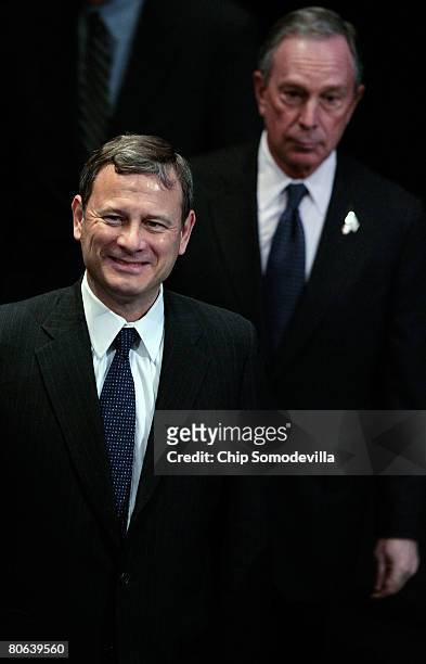 United States Supreme Court Chief Justice John Roberts and New York City Mayor Michael Bloomberg arrive for the dedication ceremony of the Newseum...