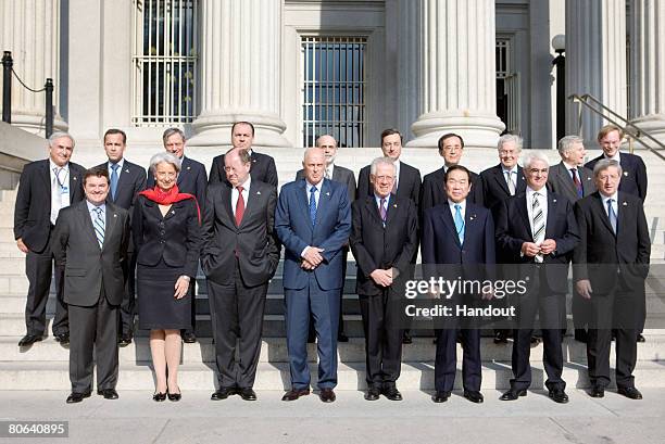 In this photo provided by the International Monetary Fund , G7 finance ministers Canadian Finance Minister Jim Flaherty, French Finance Minister...