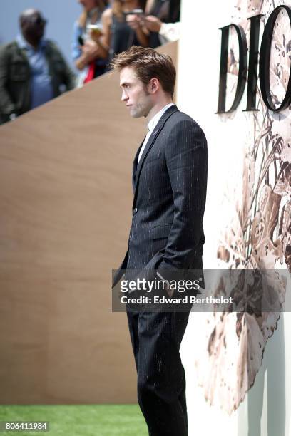 Robert Pattinson attends the Christian Dior Haute Couture Fall/Winter 2017-2018 show as part of Haute Couture Paris Fashion Week on July 3, 2017 in...