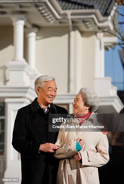 elderly couple looking at each other - stereotypically upper class stock pictures, royalty-free photos & images