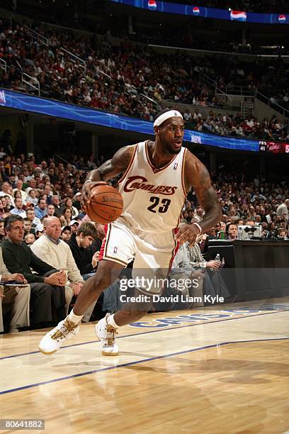 LeBron James of the Cleveland Cavaliers makes a move to the basket during the game against the Charlotte Bobcats at The Quicken Loans Arena on March...