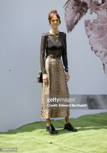 Aymeline Valade attends the Christian Dior Haute Couture Fall/Winter 2017-2018 show as part of Haute Couture Paris Fashion Week on July 3, 2017 in...