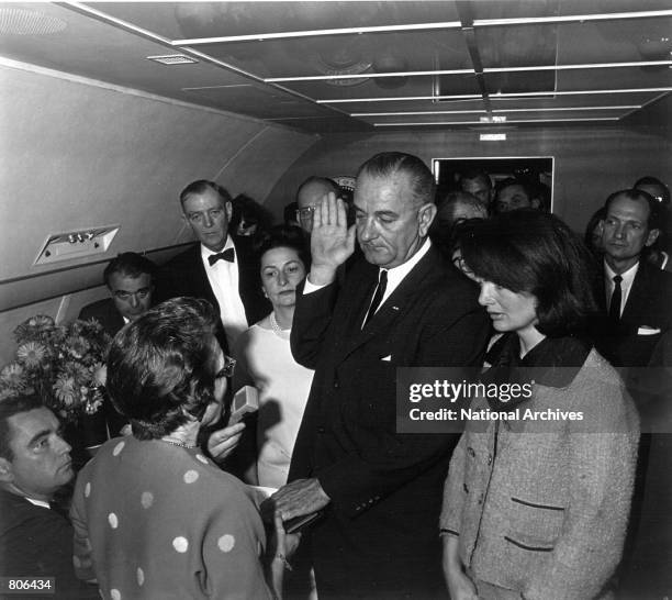 Lyndon B. Johnson takes the oath of office as President of the United States, after the assassination of President John F. Kennedy November 22, 1963.